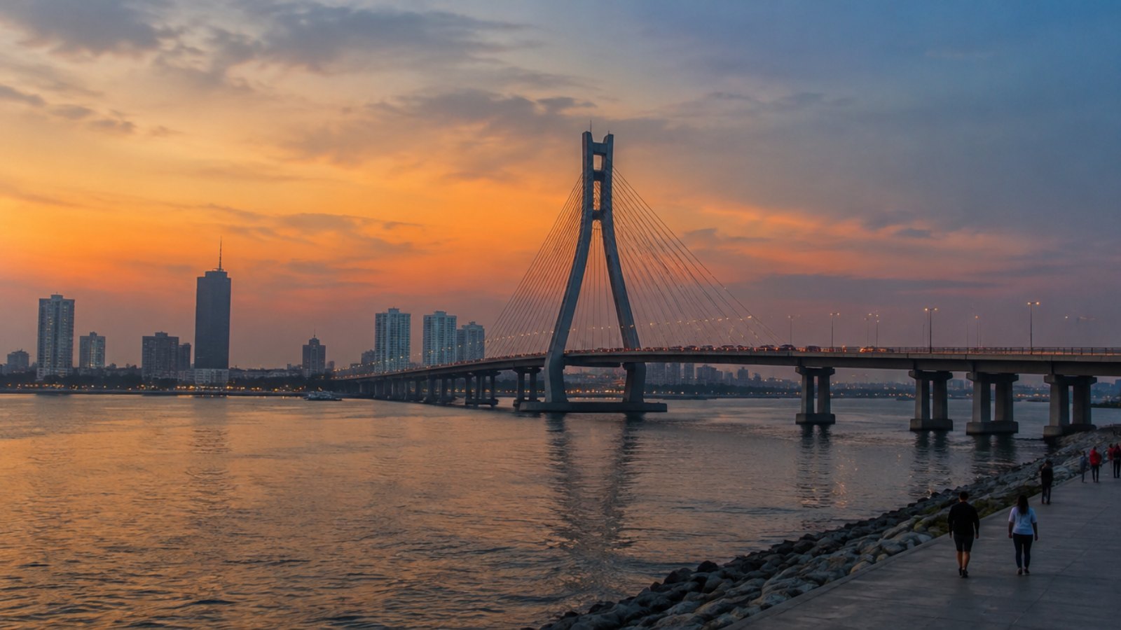 Lagos bridge and skyline at dusk seen from Lekki